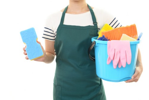 Technician preparing safe oven cleaning equipment before starting work
