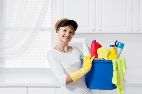 Technician carrying out a kitchen risk assessment before cleaning