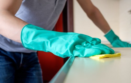 Office cleaner in Knightsbridge maintaining a polished workspace
